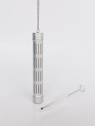 Silver aluminum loose leaf tea tubular infuser with side slits and removeable threaded ends suspended by silver chain with iced tea glass rim hook on a white backgound