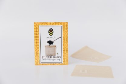 Bright orange framed box with Summit Tea logo and spoon pictured filling an unbleached drawstring tea bag with several examples on a white background