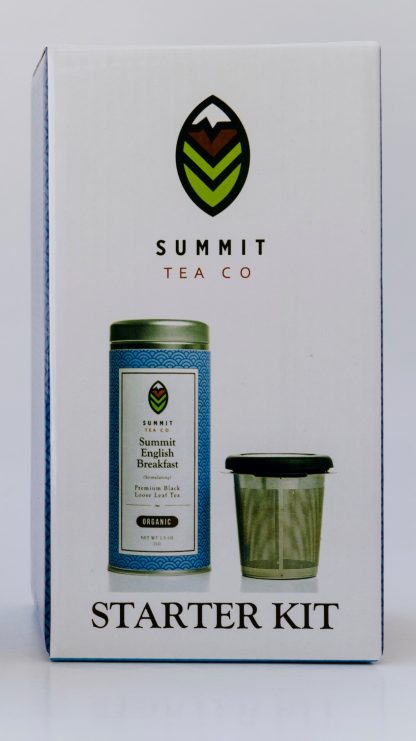 Tall white gift box with Summit Tea's logo at the top and photos of Summit English Breakfast tea in a tin with a stainless steel infuser with insulating wings and lid/saucer on white background