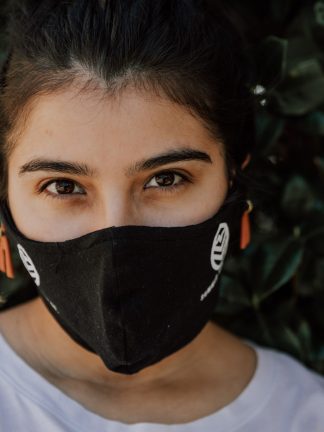 Woman wearing Black Summit Tea Cloth Facemask
