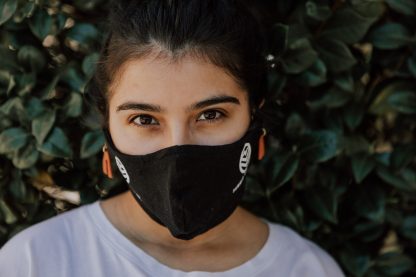 Woman wearing Black Summit Tea Cloth Facemask